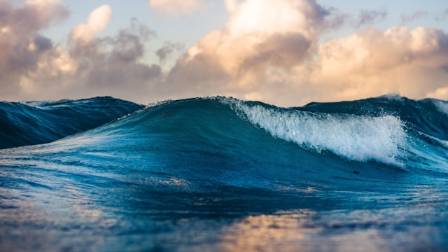 What causes ocean waves?